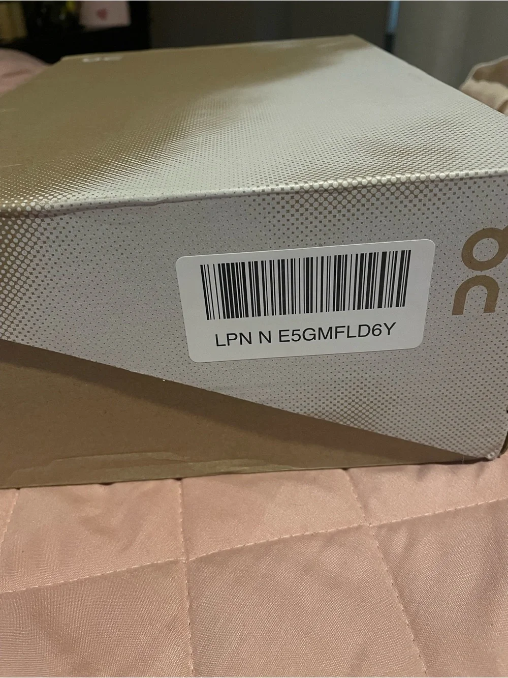 On Running Men’s Light Gray and Black Cloud-Inspired Sneakers